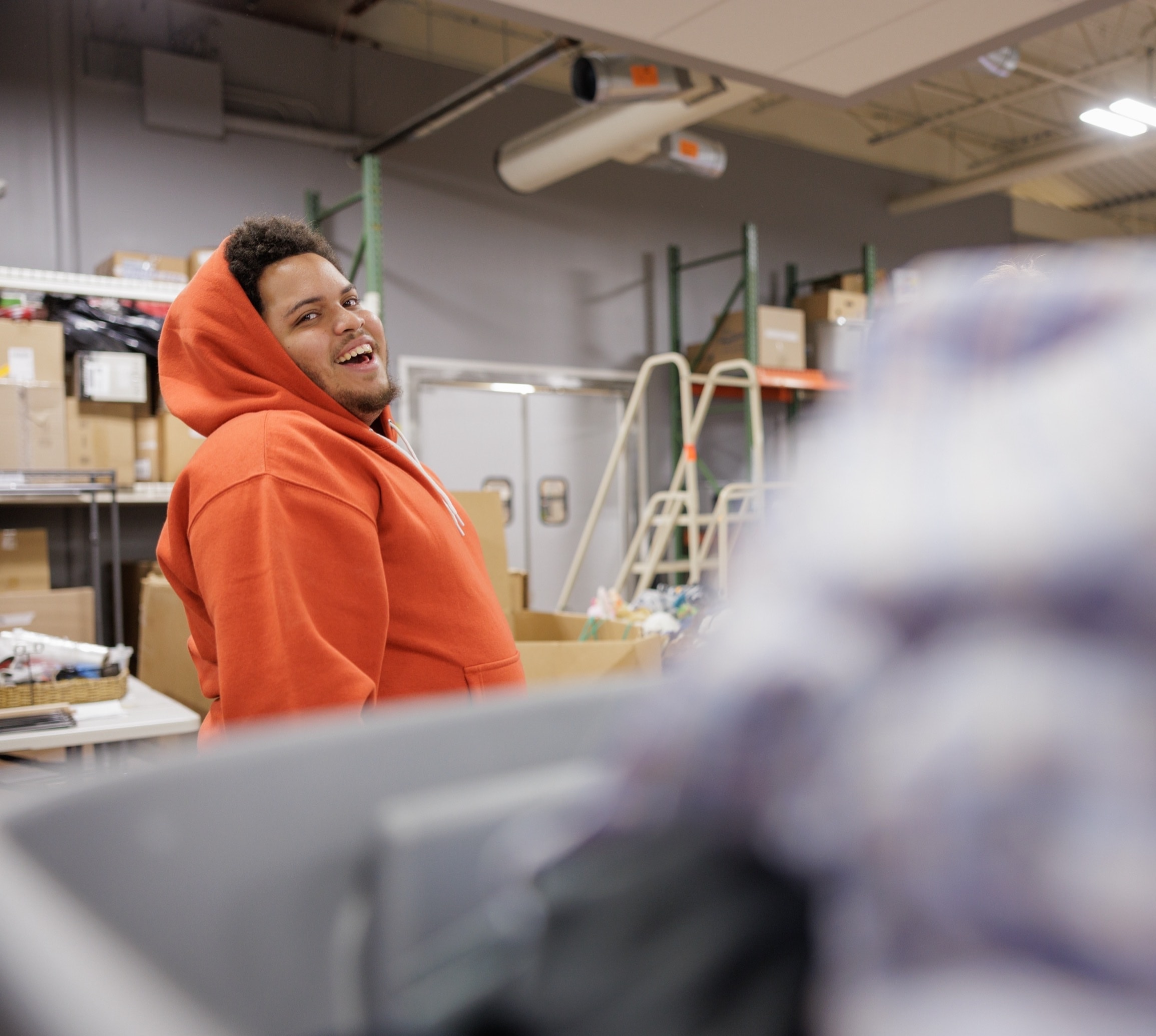 Student smiling during a warehouse placement