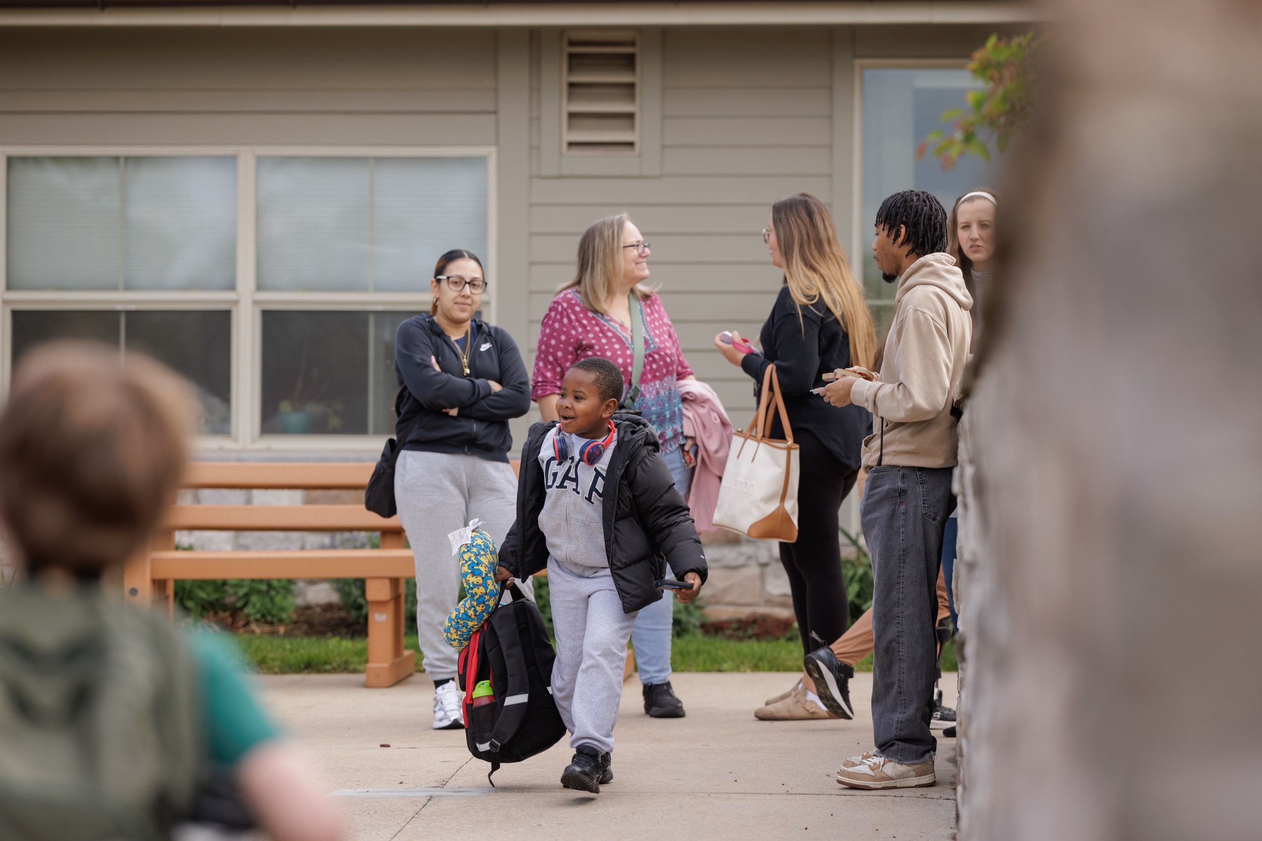 Parents and students arriving at school