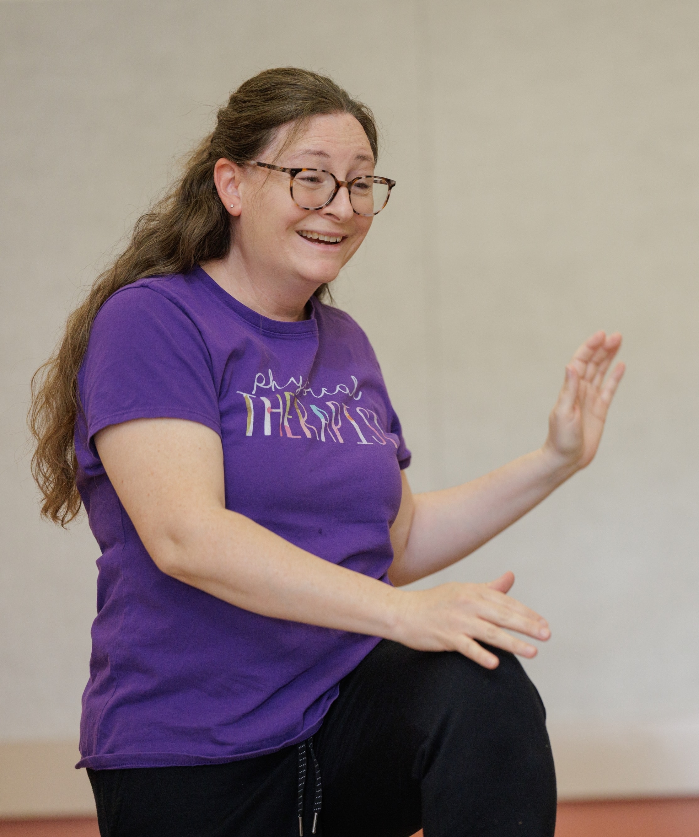 Female teacher demonstrating exercises